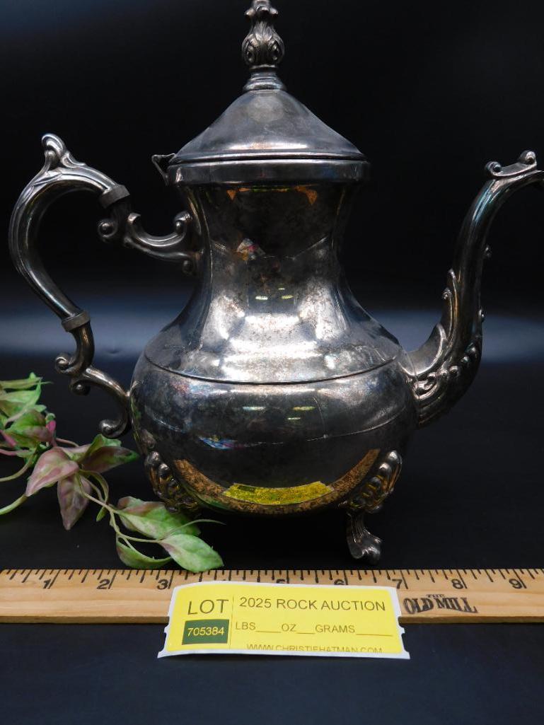 Silver-Plated Teapot with Ornate Design and Hinged Lid